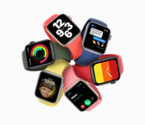 “Multiple Apple Watch models arranged in a circle showcasing different bands and watch faces”