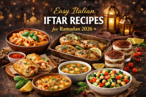 Featured image showing an elegant Italian iftar spread for Ramadan 2026 with creamy tomato pasta, herb-baked chicken, cheesy stuffed bread rolls, vegetable soup, fresh chickpea salad, and tiramisu, styled on a warm Ramadan-themed table with lanterns and crescent décor.